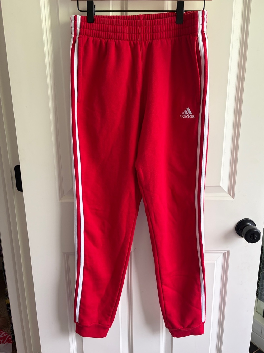 adidas Red size 14/16 Joggers with White Side Stripes. Like new! Soft. Sporty.